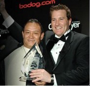 Calvin Ayre congratulates poker's top player as Men Nguyen took home the night's biggest honor at the Bodog-produced Card Player, Player of the Year Awards on Feb. 15.